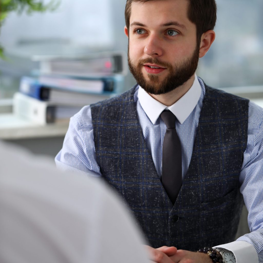 Two smiling clerk businessmen deliberate on problem at office workplace portrait. Financial advisor specialist colleague coworking audit cooperation concept